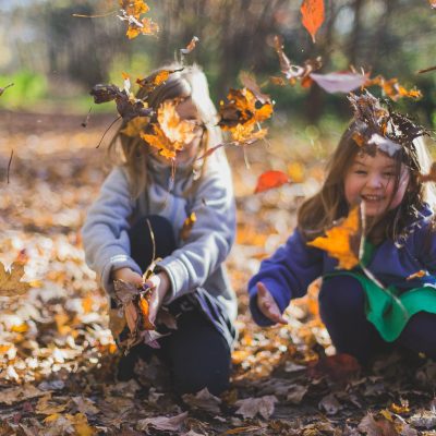 Children playing with leaves